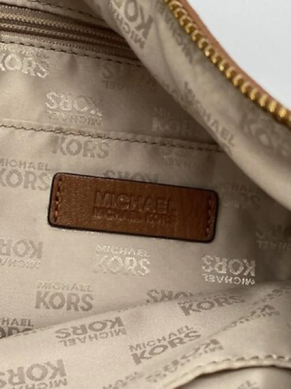 Michael Kors Brown Pebbled Leather Hobo with Gold MK Emblem